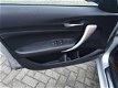 BMW 1-serie - 116d EDE Executive 5-deurs met Xenon, Navigatie, Climate & Cruise control, PDC, etc - 1 - Thumbnail