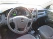 Kia Sportage - 2.0 CVVT Comfort - 1 - Thumbnail