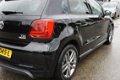 Volkswagen Polo - 1.2 TSI Edition R 1eEIG NAV/PDC/16INCH PERFECTE STAAT - 1 - Thumbnail