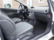 Opel Corsa - 1.4-16V Cosmo Panoramadak | PDC | Half leder | LMV | Cruise | - 1 - Thumbnail