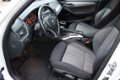 BMW X1 - sDrive20d Executive / Navigatie / Sportstoelen / Parkeerhulp - 1 - Thumbnail