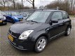 Suzuki Swift - 1.3 Cool incl. garantie - 1 - Thumbnail