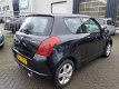 Suzuki Swift - 1.3 Cool incl. garantie - 1 - Thumbnail