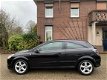 Opel Astra GTC - 1.6 Cosmo 1e Eig/Navi/Xenon/PDC - 1 - Thumbnail