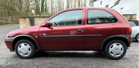 Opel Corsa - 1.2i-16V Strada - 1