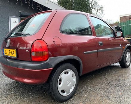 Opel Corsa - 1.2i-16V Strada - 1