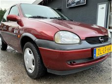 Opel Corsa - 1.2i-16V Strada