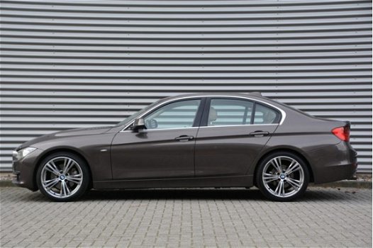 BMW 3-serie - 328i Luxury Line | 65K NP | Head-up | Leder | Sportstoelen | Elek. trekhaak | Surround - 1