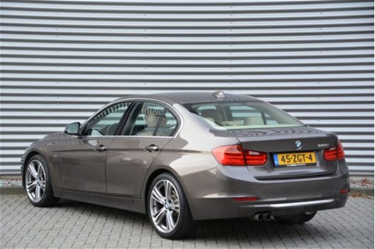 BMW 3-serie - 328i Luxury Line | 65K NP | Head-up | Leder | Sportstoelen | Elek. trekhaak | Surround - 1