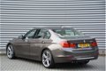 BMW 3-serie - 328i Luxury Line | 65K NP | Head-up | Leder | Sportstoelen | Elek. trekhaak | Surround - 1 - Thumbnail