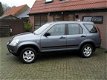 Honda CR-V - 2.0i LS 4WD 2004 Airco Half leder Trekhaak NAV NAP Nw APK - 1 - Thumbnail