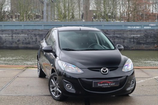 Mazda 2 - 2 1.3 BIFUEL Navigator GT / LPG G3 / NAVI / DEALER / STOELVERWM - 1