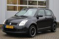 Suzuki Swift - 1.3 Base | Airco - recent grote beurt gehad - 1 - Thumbnail