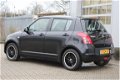 Suzuki Swift - 1.3 Base | Airco - recent grote beurt gehad - 1 - Thumbnail