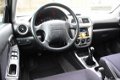 Subaru Impreza Plus - 1.6 TS AWD | Airco - Goede auto - 1 - Thumbnail