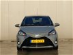 Toyota Yaris - 1.5 Hybrid Dynamic | Automaat | Navigatie | Cruise | Climate control | - 1 - Thumbnail