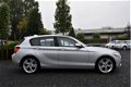 BMW 1-serie - 116i Business+ Automaat Xenon Navi 18'' - 1 - Thumbnail