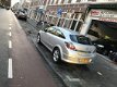 Opel Astra GTC - 1.6 Enjoy 3-drs. Airco, Elektrisch Ramen, Centraal, Stuurbekr - 1 - Thumbnail