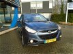 Hyundai ix35 - 2.0i i-Catcher automaat - 1 - Thumbnail