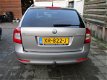 Skoda Octavia Combi - 2.0 TDI 140pk DSG met Navi/Xenon/Trekhaak - 1 - Thumbnail