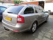 Skoda Octavia Combi - 2.0 TDI 140pk DSG met Navi/Xenon/Trekhaak - 1 - Thumbnail