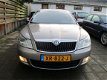 Skoda Octavia Combi - 2.0 TDI 140pk DSG met Navi/Xenon/Trekhaak - 1 - Thumbnail