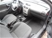 Opel Corsa - 1.2i 16V Njoy 3 Drs. 75pk Cruise | CPV | Mooi - 1 - Thumbnail