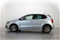 Volkswagen Polo - 1.4 TDI BlueMotion Navigatie Stuurbediening Parkeersensoren Airco - 1 - Thumbnail