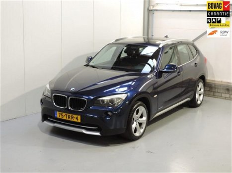 BMW X1 - SDrive20i Business panodak / navigatie /rijklaar prijs - 1