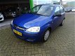 Opel Corsa - 1.0-12V Rhythm 5 deurs automaat Cruise contr, - 1 - Thumbnail