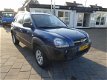 Hyundai Tucson - 2.0 CRDi Dynamic Airco Boekjes N.A.P APK 29-1-2021 - 1 - Thumbnail