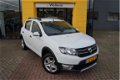 Dacia Sandero - 0.9 TCe Stepway Lauréate NAVIGATIE / CRUISE CONTROLE / AIRCO / PARKEERSENSOR - 1 - Thumbnail