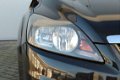 Ford Focus - 1.8-126pk. Titanium Flexi Fuel. Airco, navi Zeer nette auto - 1 - Thumbnail