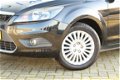 Ford Focus - 1.8-126pk. Titanium Flexi Fuel. Airco, navi Zeer nette auto - 1 - Thumbnail