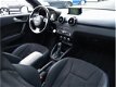 Audi A1 Sportback - 1.6TDI 116pk S-Tronic 2xS-Line Pano Xenon-Led Navi 18-Inch-RS Zetels H-Leder PDC - 1 - Thumbnail