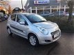 Suzuki Alto - 1.0 Exclusive airco, lichtmetalen velgen, stootlijsten, radio cd speler, 1e particulie - 1 - Thumbnail