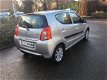 Suzuki Alto - 1.0 Exclusive airco, lichtmetalen velgen, stootlijsten, radio cd speler, 1e particulie - 1 - Thumbnail