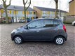 Hyundai i10 - 1.0 i-Drive Cool Eerste eigenaar / Airco / 75.000 NAP / Parkeersensoren achter - 1 - Thumbnail