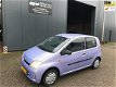 Daihatsu Cuore - 1.0-12V Tokyo 1jaar apk/ nap/ nette auto/ meeneemprijs - 1 - Thumbnail