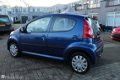 Peugeot 107 - 1.0-12V 5-Drs XS Airco Centr.Vergr. Elek, Ramen Toerenteller Radio/Cd/Aux 12V.-Aansl. - 1 - Thumbnail