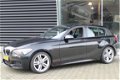 BMW 1-serie - 125i AUT 218PK M-Pakket Dak Cruise Airco PDC - 1 - Thumbnail