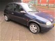 Opel Corsa - 1.4i-16V Sport - 1 - Thumbnail