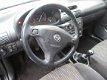 Opel Corsa - 1.4i-16V Sport - 1 - Thumbnail