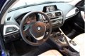 BMW 1-serie - 118i EDE Corporate Lease Essential NAV.Automaat - 1 - Thumbnail