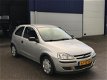 Opel Corsa - 1.2-16V Rhythm Cruise/ MFC/ NAP/ APK - 1 - Thumbnail