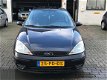 Ford Focus - 1.4-16V Ambiente Airco/ 5Dr/ El. raam - 1 - Thumbnail