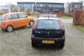 Opel Corsa - 1.2-16V Comfort Nette auto zo mee - 1 - Thumbnail