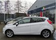 Ford Fiesta - 1.25 Titanium 5-DEURS / AIRCO/ECC / CRUISE CONTR - 1 - Thumbnail