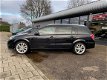 Opel Astra Wagon - 1.6 Cosmo PANORAMADAK CRUISE CONTROLE XENON PARKEERHULP AUTOM.AIRCO GETINTE RUITE - 1 - Thumbnail