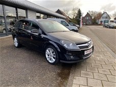 Opel Astra Wagon - 1.6 Cosmo PANORAMADAK CRUISE CONTROLE XENON PARKEERHULP AUTOM.AIRCO GETINTE RUITE